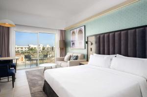 Katil atau katil-katil dalam bilik di Radisson Blu Resort Saidia Beach