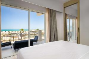 Katil atau katil-katil dalam bilik di Radisson Blu Resort Saidia Beach
