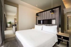 Katil atau katil-katil dalam bilik di Radisson Blu Resort Saidia Beach