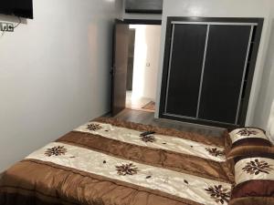 Ένα ή περισσότερα κρεβάτια σε δωμάτιο στο mohammédia -la siesta