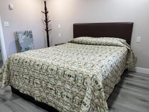 Ένα ή περισσότερα κρεβάτια σε δωμάτιο στο Kluane Park Inn