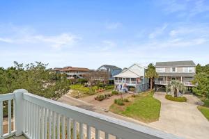 a view from the balcony of a house at CasaUp Charming Duplex in Beautiful Pawleys Island in Pawleys Island