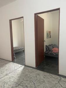 Postel nebo postele na pokoji v ubytování Homestay Abor