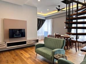 TV a/nebo společenská místnost v ubytování Hotel Lavie at Centrum