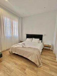 Postel nebo postele na pokoji v ubytování Escapada Acogedora cerca de IFEMA Madrid