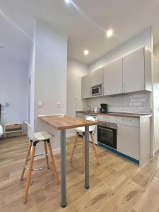 Kuchyň nebo kuchyňský kout v ubytování Escapada Acogedora cerca de IFEMA Madrid