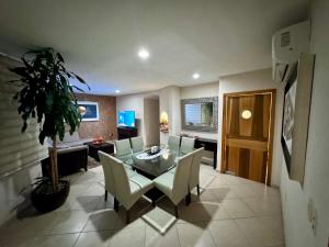 TV a/nebo společenská místnost v ubytování Gran Alojamiento de Lujo Climatizado