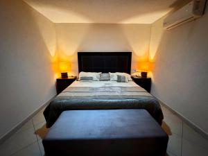 Postel nebo postele na pokoji v ubytování Gran Alojamiento de Lujo Climatizado + 24 fotografií