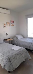 Postel nebo postele na pokoji v ubytování Casa Brisas de Drummond