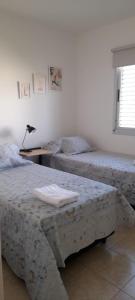 Postel nebo postele na pokoji v ubytování Casa Brisas de Drummond + 2 fotografie