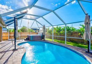 The swimming pool at or close to Four Bedrooms Oasis with Heated Pool Private Jacuzzi and Billiards