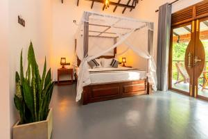 Voodi või voodid majutusasutuse Heavenly Hideaway toas