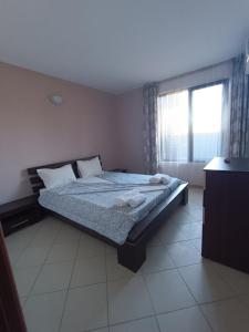Ένα ή περισσότερα κρεβάτια σε δωμάτιο στο Oasis beach house , apartment Nevena