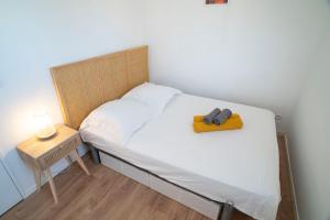 Кровать или кровати в номере T2 Les Dauphins Giens