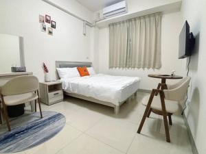 Voodi või voodid majutusasutuse Ling Lai B&B toas