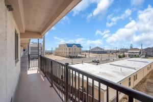 a balcony with a view of a building at Jersey Shore Getaway in Seaside Heights