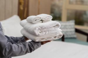 Postel nebo postele na pokoji v ubytování Damask Hotels + 37 fotografií