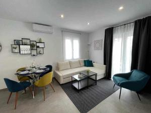 Et opholdsområde på XIX C Apartamentos Morales & Arnal