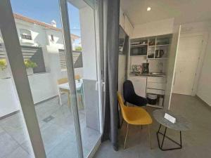 Et tv og/eller underholdning på XVII A Suite Apartamentos Morales & Arnal