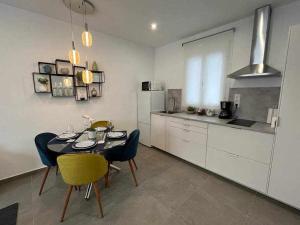 Køkken eller tekøkken på XXI E Apartamentos Morales & Arnal + 17 billeder