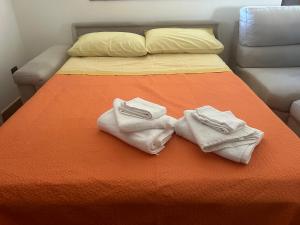 Postel nebo postele na pokoji v ubytování Ndiscialamu Casa Vacanze