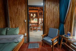 Χώρος καθιστικού στο Cinnamon Eco Lodge