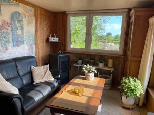 Istumisnurk majutusasutuses Uniek Tiny house nabij de kust in mooie polders