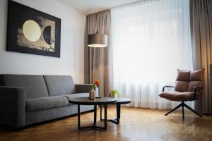 Posezení v ubytování JUNIK Apartments Oberhausen
