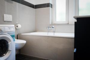 Koupelna v ubytování JUNIK Apartments Oberhausen
