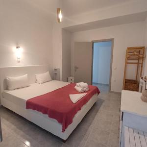 Postel nebo postele na pokoji v ubytování Kondilw Rooms