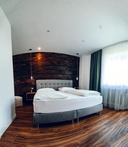 Postel nebo postele na pokoji v ubytování Pension Baumgartner-Berghof