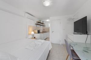 TV a/nebo společenská místnost v ubytování Apartments Petrina