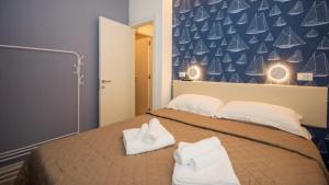 Ένα ή περισσότερα κρεβάτια σε δωμάτιο στο Tiny House