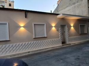 a building with lights on the side of it at B&B Villa Soleil in Vibo Valentia