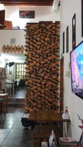 TV a/nebo společenská místnost v ubytování Casa Hostal La Vie en Rose