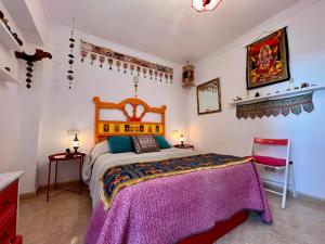 Postel nebo postele na pokoji v ubytování La Casa de La Abuela Rosy + 37 fotografií