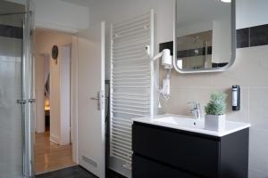 Koupelna v ubytování JUNIK Apartments Oberhausen