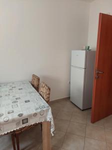 Kuchyň nebo kuchyňský kout v ubytování Vesna apartmani, Igalo