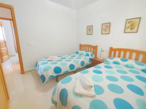 Posteľ alebo postele v izbe v ubytovaní Apartment Cala de Nerja SpainSunRentals 1083