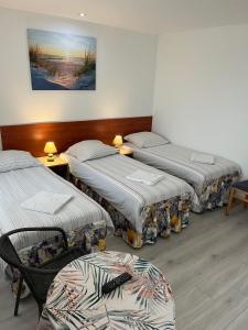 Posteľ alebo postele v izbe v ubytovaní Stilo Hotel