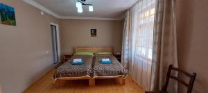 Letto o letti in una camera di Guesthouse Robi