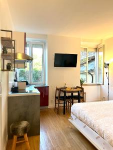 Postel nebo postele na pokoji v ubytování Le Roi Soleil - Proche Avenue de Paris - Cozy