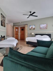 Postel nebo postele na pokoji v ubytování Aparthotel Résidence Bara Midi + 37 fotografií
