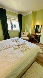 Posteľ alebo postele v izbe v ubytovaní Apartments Anica