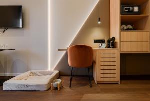 TV a/nebo společenská místnost v ubytování The CORNR Hotel