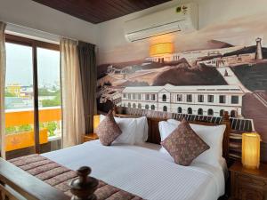 Postel nebo postele na pokoji v ubytování La Plage Seaview Suites