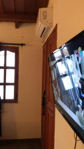 TV a/nebo společenská místnost v ubytování Casa Hostal La Vie en Rose