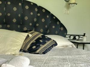 Postel nebo postele na pokoji v ubytování Agriturismo Melodie Toscane Sorano