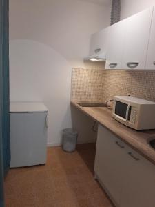 Una cocina o cocineta en Studio Urbain Cosy-Touche Rétro 2