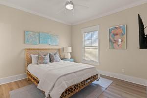a bedroom with a large bed and a window at Time Flys - 498 Baisden Lane in Mallory Park +19 photos
